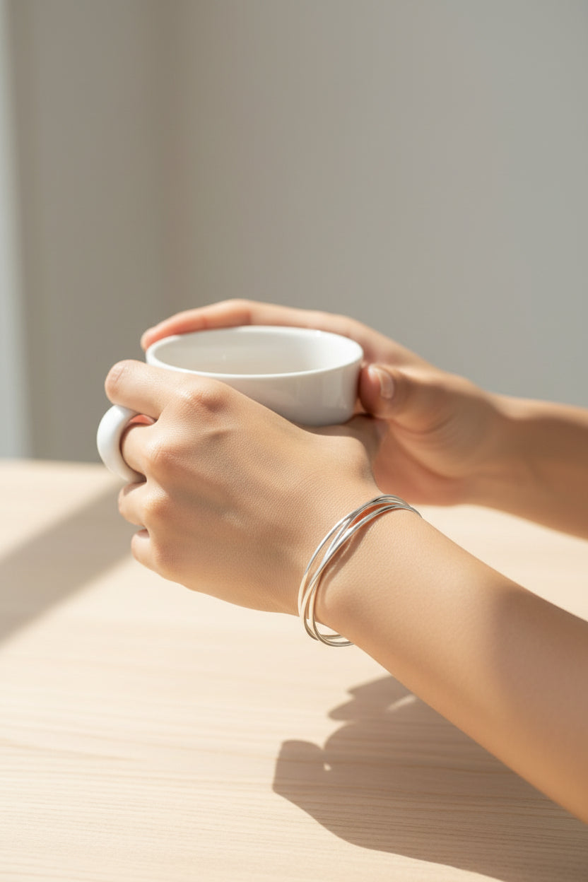 Interlocking silver bangles