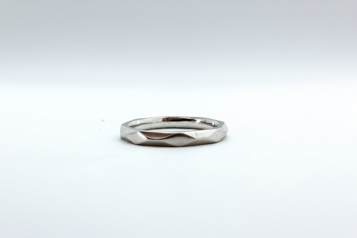 Silver ring on a white background