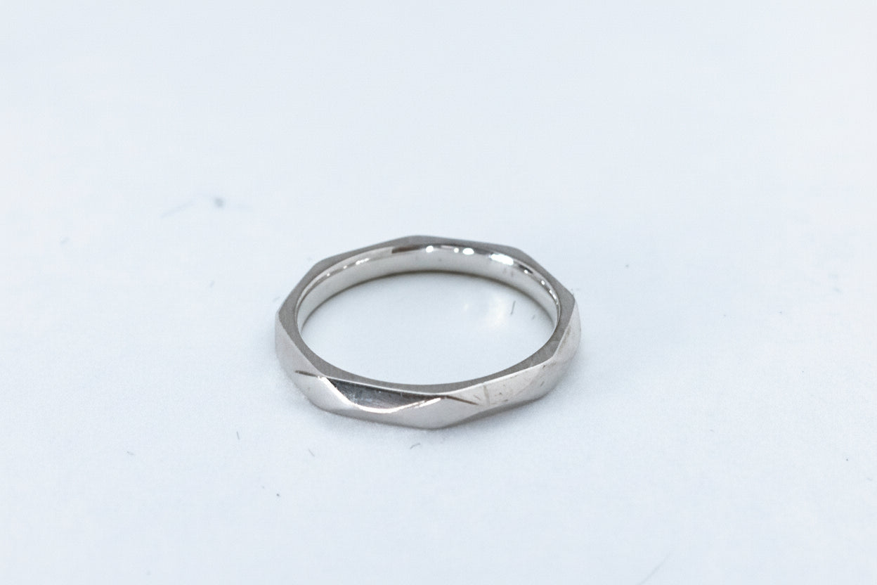 Silver ring on a white background