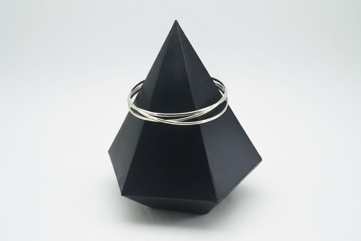 Interlocking silver bangles