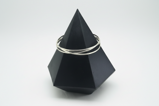 Interlocking silver bangles