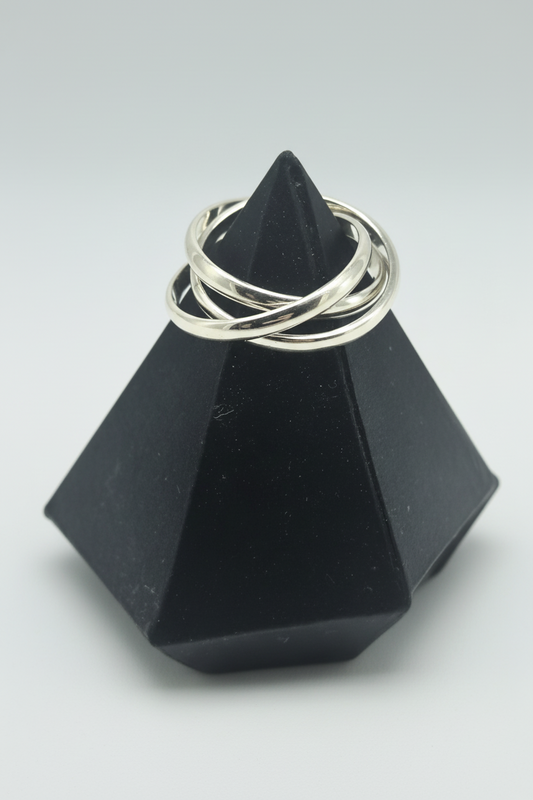 Silver ring on a black faceted stone